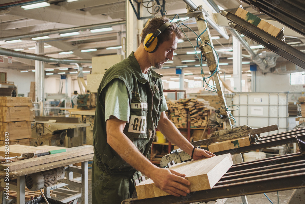 Man Working At The Furniture Factory Man Working At The Furniture Factory