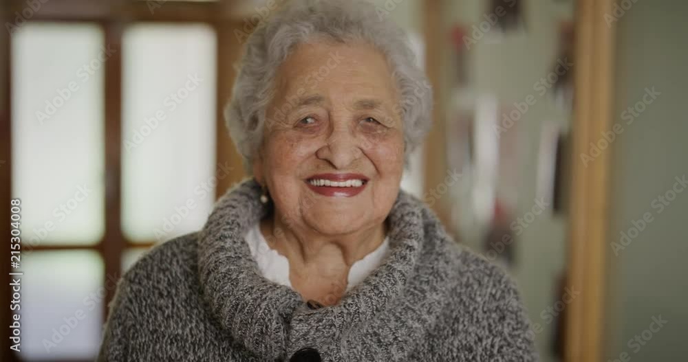 portrait of happy elderly woman laughing cheerful enjoying relaxed lifestyle in retirement home beautiful old lady smiling indoors portrait of happy elderly woman laughing cheerful enjoying relaxed lifestyle in retirement home beautiful old lady smiling indoors