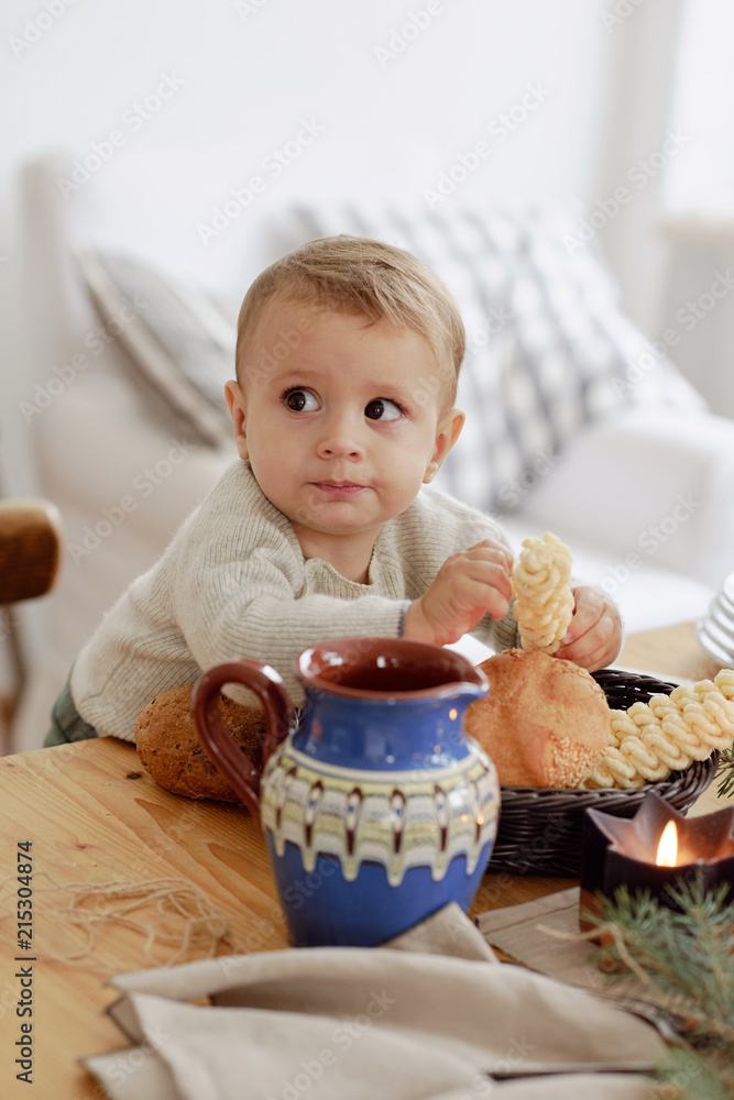 Cute baby boy with bread Cute baby boy with bread