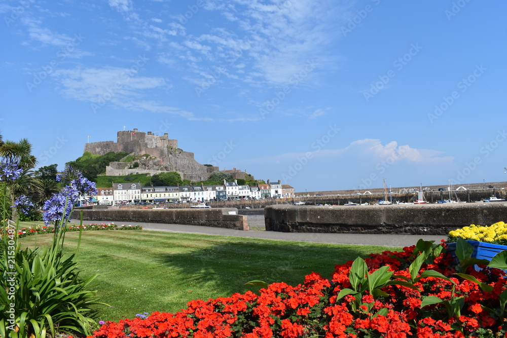 Mont Orgueil casting its shadow over the beautiful fishing village of Gorey. Jersey, England