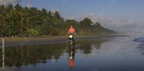 Young woman on a Motocross bike photo