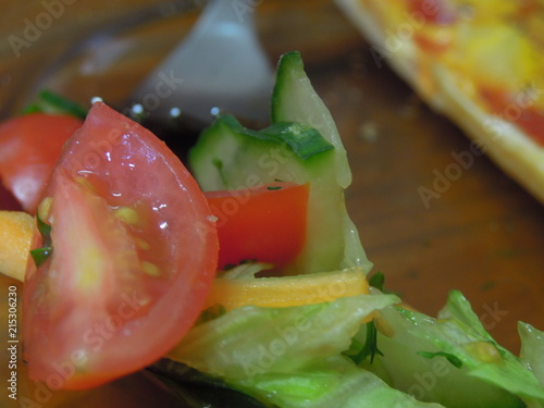 Salad closeup with  tomato an cucumber 