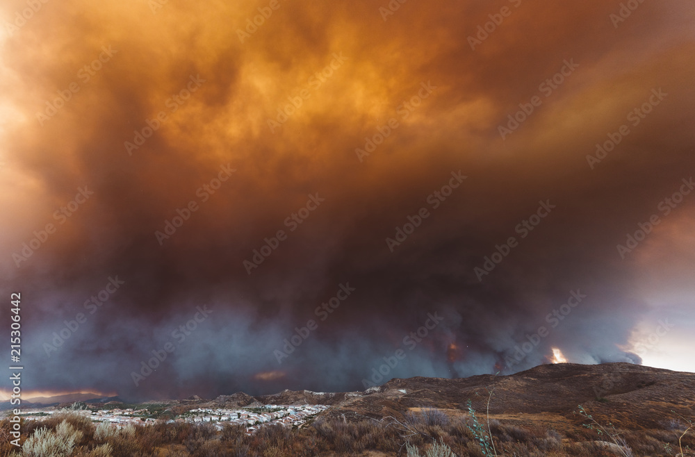 California wildfire threatening a neighborhood 