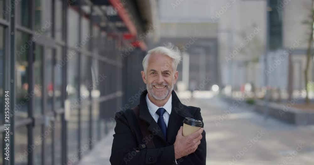 portrait confident middle aged businessman smiling happy corporate boss enjoying professional career success senior entrepreneur relaxing in city slow motion ambition lifestyle portrait confident middle aged businessman smiling happy corporate boss enjoying professional career success senior entrepreneur relaxing in city slow motion ambition lifestyle