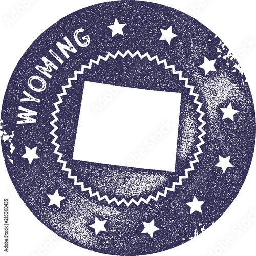 Wyoming map vintage stamp. Retro style handmade label, badge or element for travel souvenirs. Deep purple rubber stamp with US state map silhouette. Vector illustration.