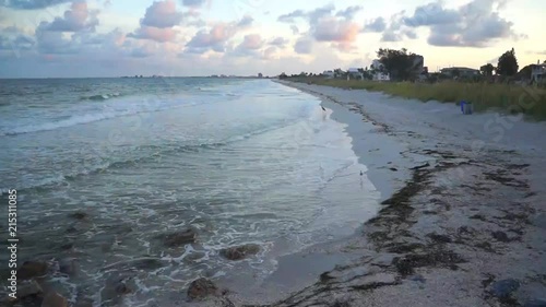 Waves on Shoreline of Passagrille Beach at Sunrise photo