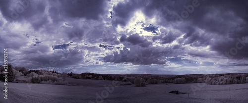 infrared photography - ir photo of landscape under sky with clouds - the art of our world in the infrared camera spectrum 