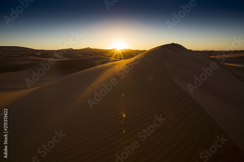 Spectecular sunrise in the Sahara near Merzouga  Morocco