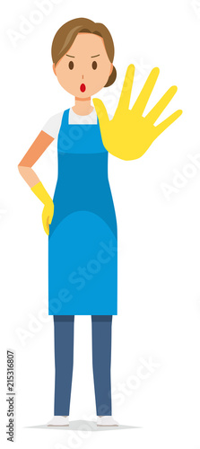 A woman wearing a blue apron and rubber gloves is stop gesture