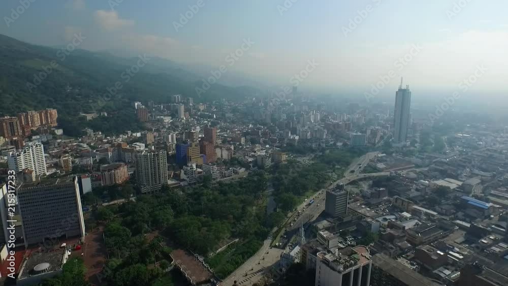 Aerial: Panoramic view of Cali, Colombia with valley in the background. Aerial: Panoramic view of Cali, Colombia with valley in the background.