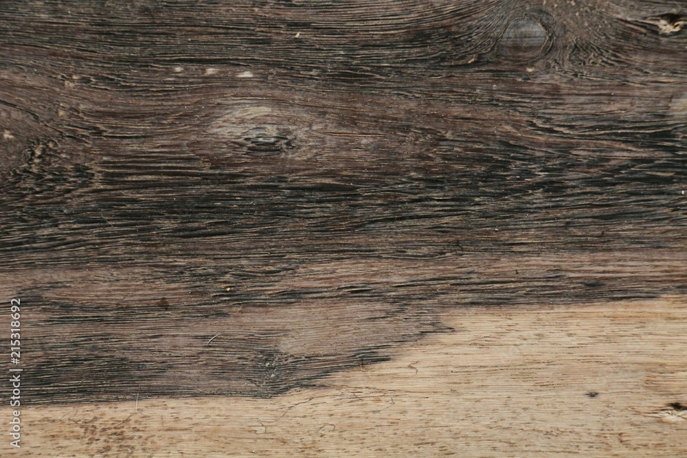 Fototapeta premium Brown and black wood texture background.