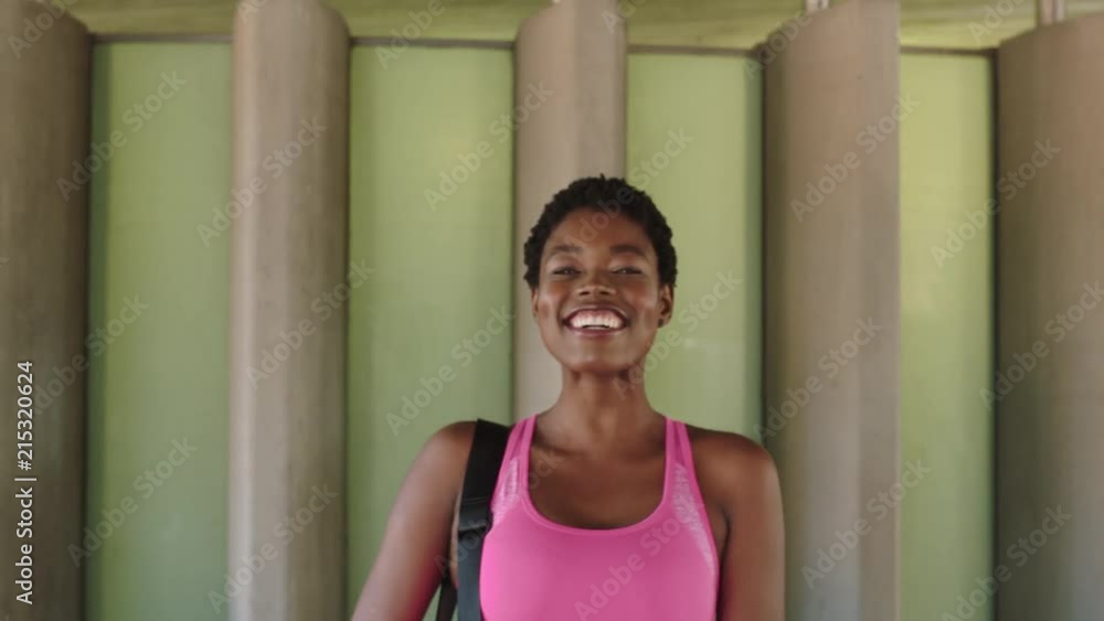 portrait of fit young african american woman smiling happy laughing portrait of fit young african american woman smiling happy laughing
