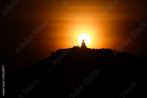 Silhouette buddha sunset warm lansscape