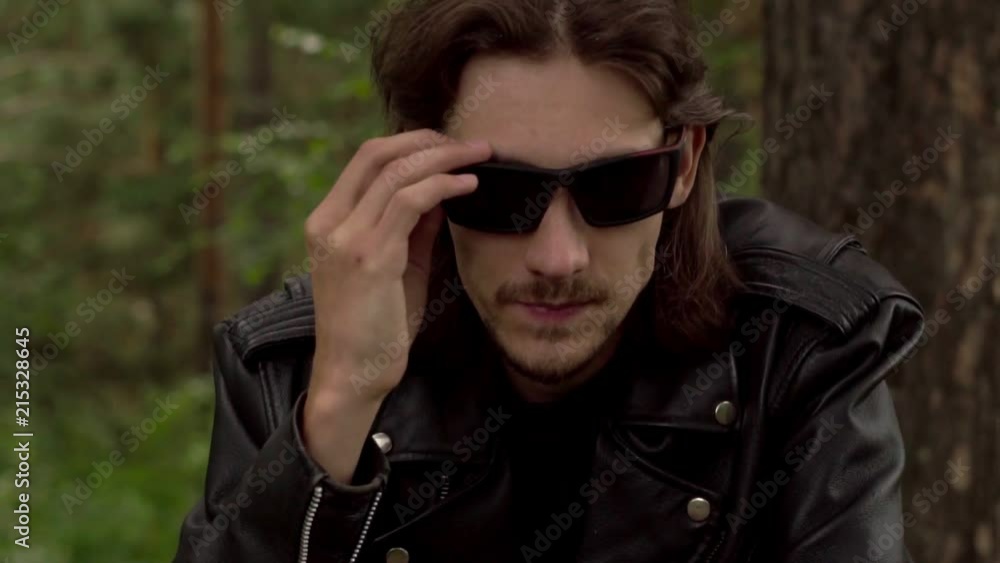 the guy in the leather jacket and glasses the guy in the leather jacket and glasses