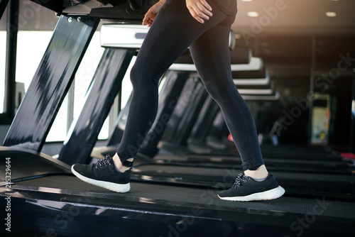 Female fitness run on treadmill