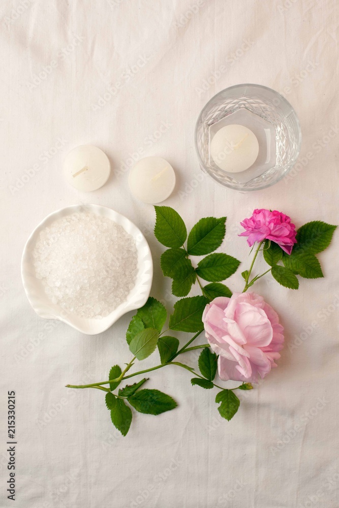 Beautiful spa composition on white tissue background. Concept of relax, wellness and mindfulness. Beautiful spa composition on white tissue background. Concept of relax, wellness and mindfulness.