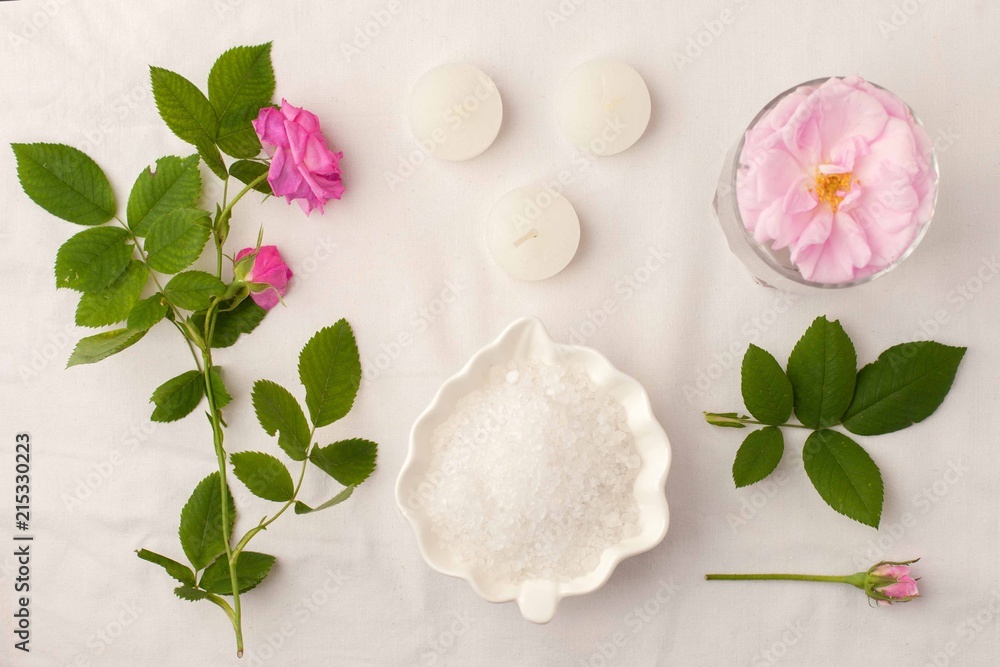 Beautiful spa composition on white tissue background. Concept of relax, wellness and mindfulness. Beautiful spa composition on white tissue background. Concept of relax, wellness and mindfulness.
