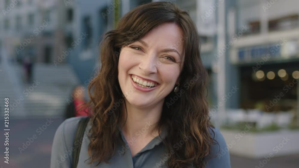 close up portrait of lovely elegant independent woman laughing happy on urban sidewalk close up portrait of lovely elegant independent woman laughing happy on urban sidewalk