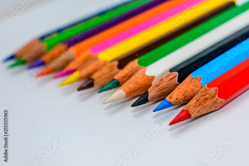 Colored pencil set loosely arranged.