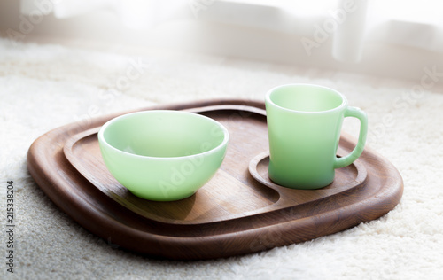 Vintage mug and bowl on teak tray