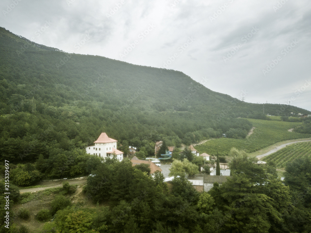 old europe small mountain village during rainy dark stormy day. moody concept old europe small mountain village during rainy dark stormy day. moody concept