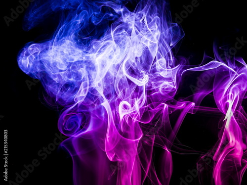 Colored smoke on black background