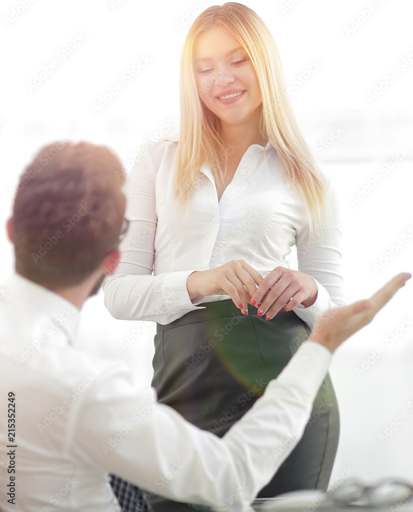 Obraz premium background image colleagues near the desktop. business background.