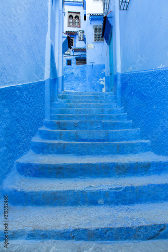Blue-washed staircase in the old town of Chefchaouen, Morocco © spumador