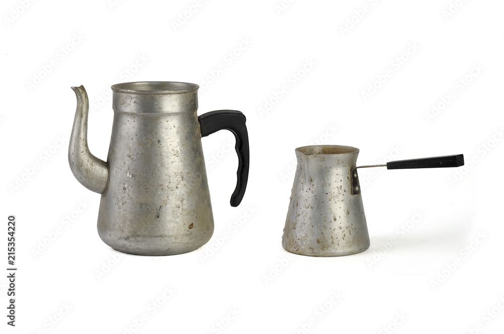 old metal teapot and cezve for turkish coffee isolated on white background old metal teapot and cezve for turkish coffee isolated on white background