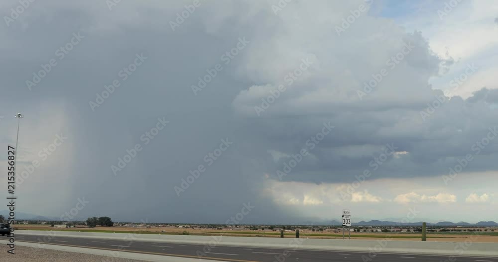 A microburst over the desert from a highway A microburst over the desert from a highway