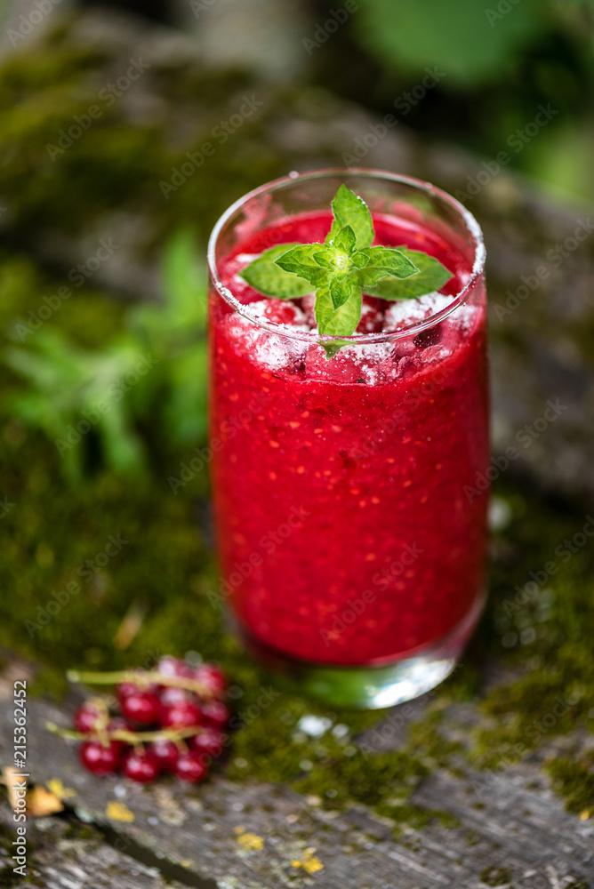 Raspberry smoothies with mint on rustic background Raspberry smoothies with mint on rustic background