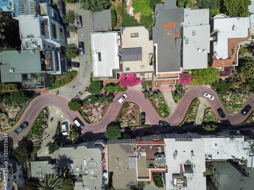 Panorama view aerial Lombard Street, an east–west street in San Francisco, California. Famous for steep, one-block section with eight hairpin turns. Crookedest, steep hills, sharp curves, one-way road