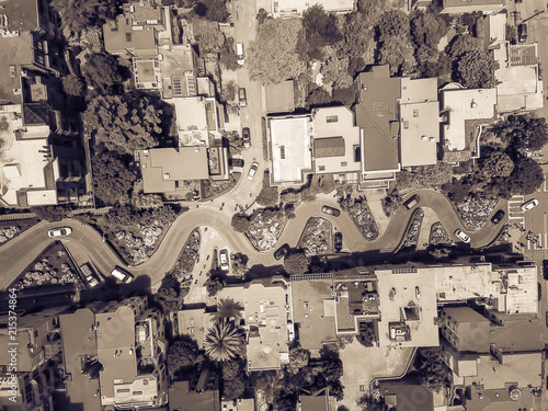 Vintage tone aerial Lombard Street, an east–west street in San Francisco, California. Famous for steep, one-block section with eight hairpin turns. Crookedest, steep hills, sharp curves, one-way road