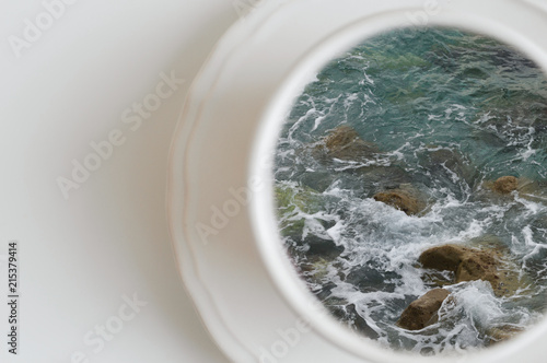Cup of ocean, cup of sea. Creative concept