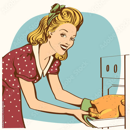 Portrait of Young beautiful housewife in red dress cooking roasted chicken.