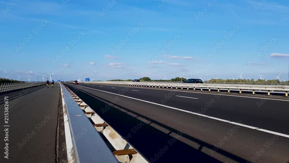 looking at the highway seen from a bikerlane (eye sight) looking at the highway seen from a bikerlane (eye sight)