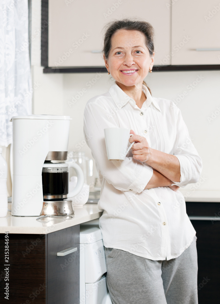 woman preparing coffee