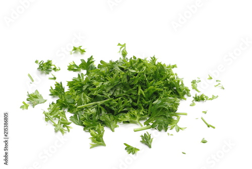 Fresh green chopped parsley leaves isolated on white background 