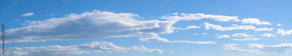 Fototapeta premium Blue sky background with white clouds panorama