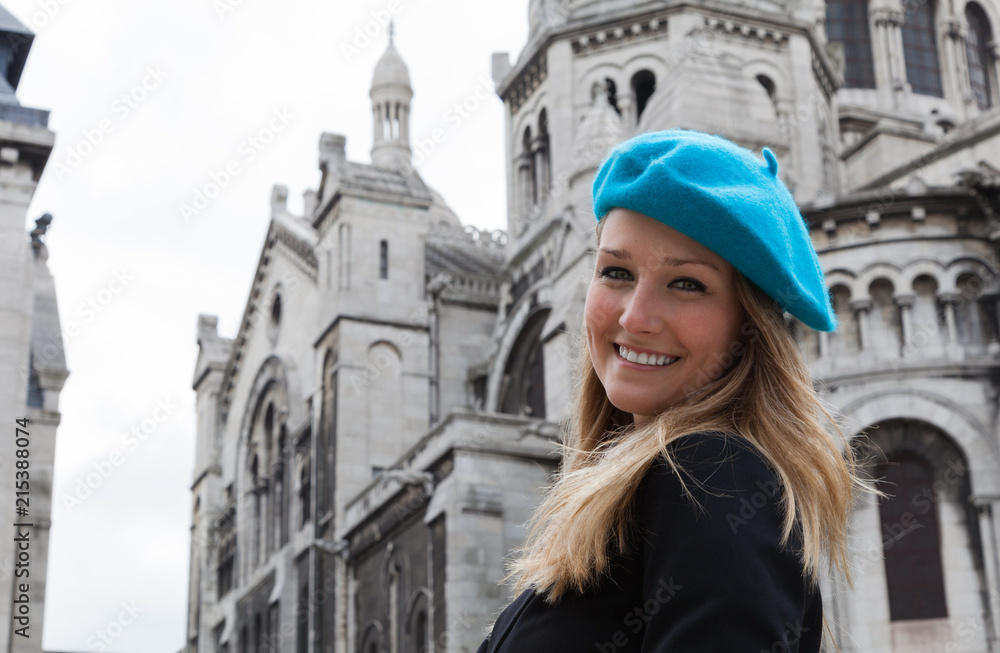 Smiling Young Woman Looking at Camera at Sacre Coeur in Paris