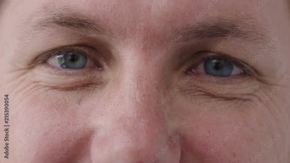 close up man blue eyes looking funny happy caucasian male healthy eyesight satisfaction close up man blue eyes looking funny happy caucasian male healthy eyesight satisfaction