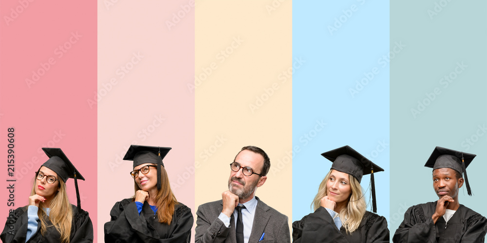 Obraz premium Senior teacher with his graduate students thinking and looking up expressing doubt and wonder
