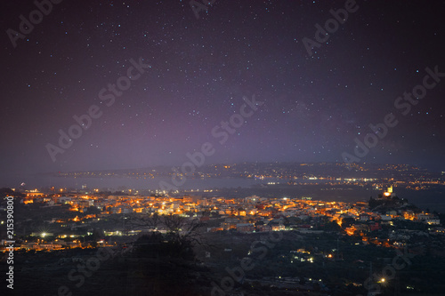 Siracusa , Italy, seen from above, with the Milky way