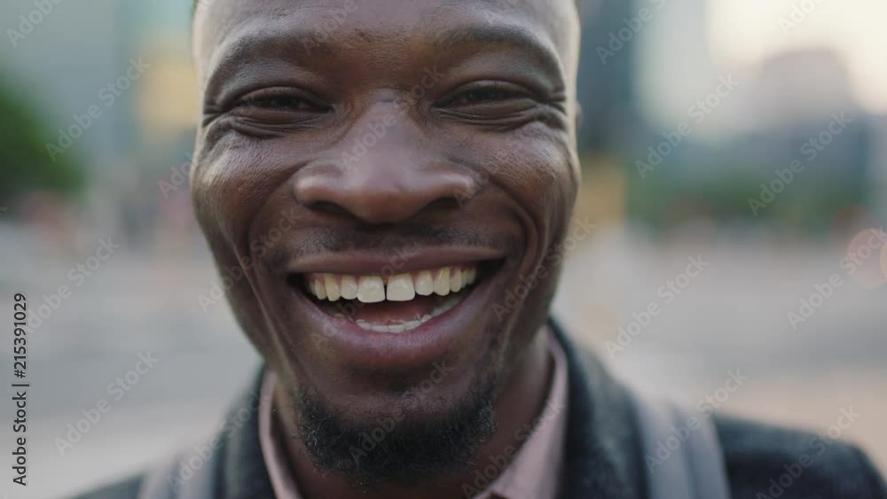 close up portrait of confident young african american businessman laughing enjoying successful lifestyle close up portrait of confident young african american businessman laughing enjoying successful lifestyle