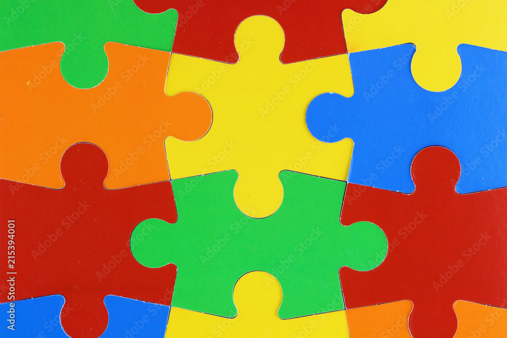 piezas de colores de un puzzle encajadas con espacio para texto en ellas piezas de colores de un puzzle encajadas con espacio para texto en ellas