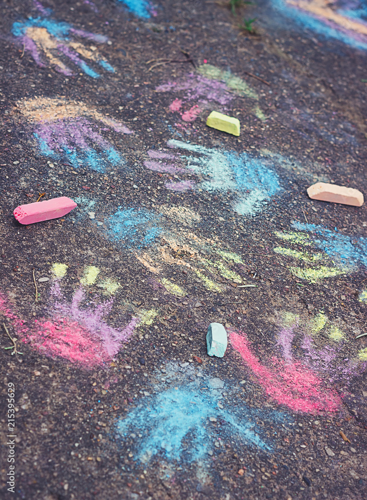 Fototapeta premium Color hands prints on pavement