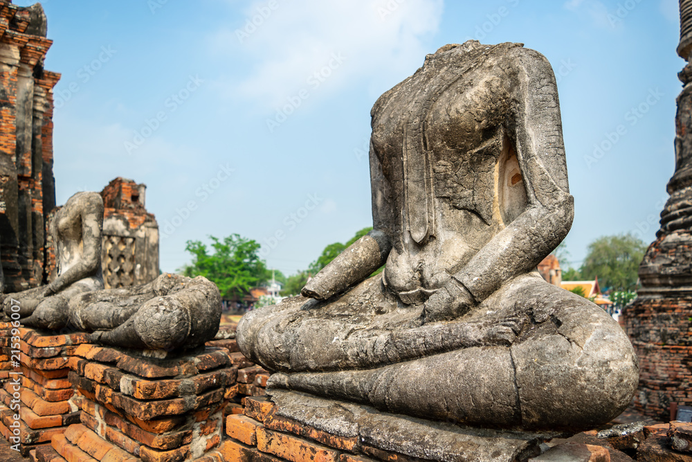 Headless Buddha's statues at Wat Chaiwatthanaram, which is the ancient Buddhist temple in Ayutthaya province, Thailand. 