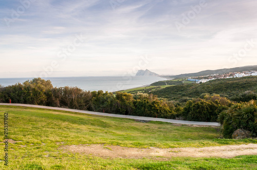 Beach and golf field in La Alcaidesa, Costa del Sol, Spain with Gibraltar in the horizon