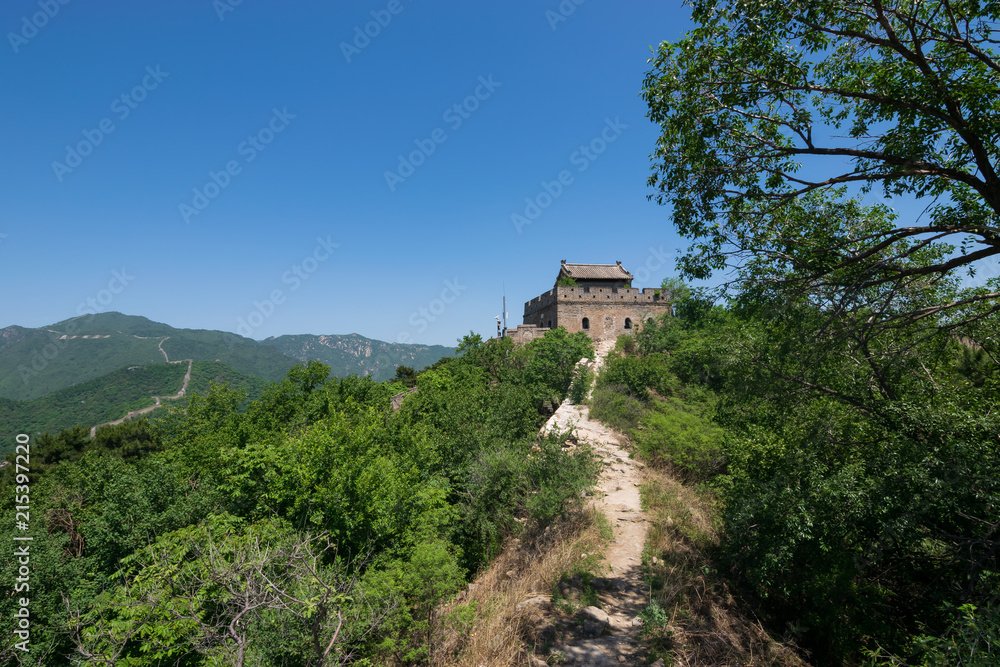 View of the ruins of the Great Wall of China at Mutianyu section in northeast of central Beijing, China.