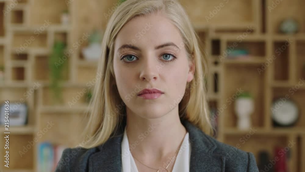 close up portrait of attractive young blonde business executive looking serious intimidating wearing suit pensive thoughtful close up portrait of attractive young blonde business executive looking serious intimidating wearing suit pensive thoughtful